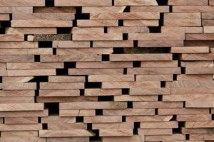 End grain view of stacked lumber